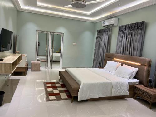 Ένα ή περισσότερα κρεβάτια σε δωμάτιο στο TD’s place