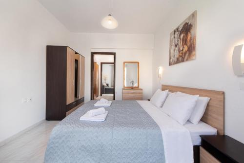 A bed or beds in a room at Dolce Casa Suite1