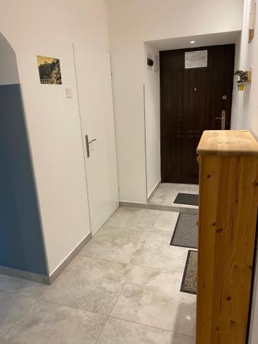 an empty room with a door and a hallway at Wałbrzych blisko Teatru in Wałbrzych