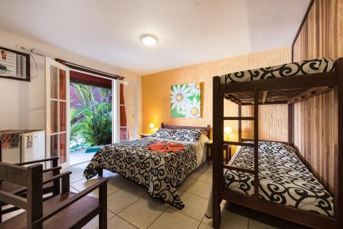 Ένα ή περισσότερα κρεβάτια σε δωμάτιο στο Meu Sonho Búzios