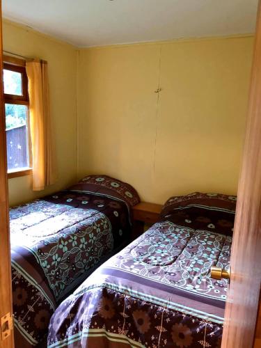 Letto o letti in una camera di Cabañas Vista al Paine