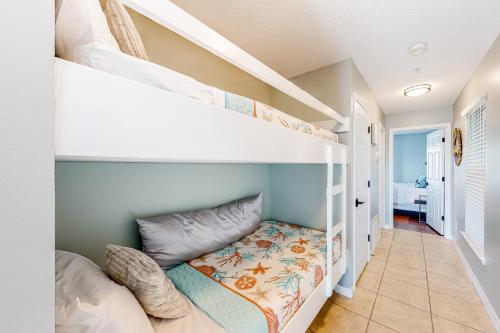 a bedroom with a bunk bed in a room at Gulf Island 412 in Navarre