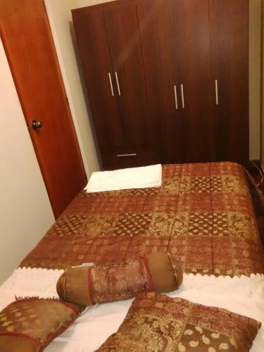 Cama o camas de una habitación en Hospedaje Las Lilas Surco