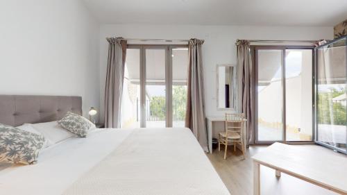 Ένα ή περισσότερα κρεβάτια σε δωμάτιο στο Bellevall hotel