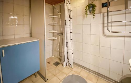 a bathroom with a shower and a toilet at Lovely Home In Laholm With Wifi in Laholm