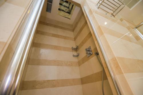 a bathroom with a shower in a room at Gabala Garden Hotel in Gabala