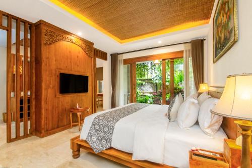 Un ou plusieurs lits dans un hébergement de l'établissement Weda Cita Resort and Spa by Mahaputra