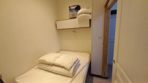 Katil atau katil-katil dalam bilik di STUDIOS ET APPARTEMENTS EN CENTRE VILLE Boulogne sur mer