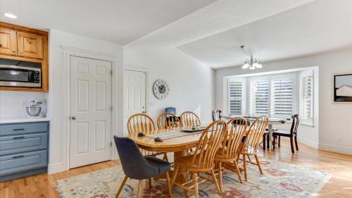 a dining room with a table and chairs at Play & Gather in Luxury,Pets too! Close to it Everything! in Orem