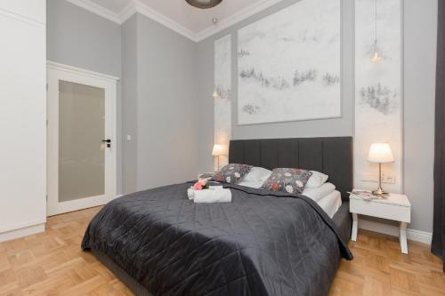 Posteľ alebo postele v izbe v ubytovaní Warszawa Ochota Modern Apartment for Families by Noclegi Renters