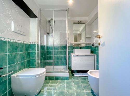 Et badeværelse på Bel quadrilocale con terrazza nel centro storico