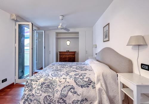 En eller flere senge i et værelse på Bel quadrilocale con terrazza nel centro storico