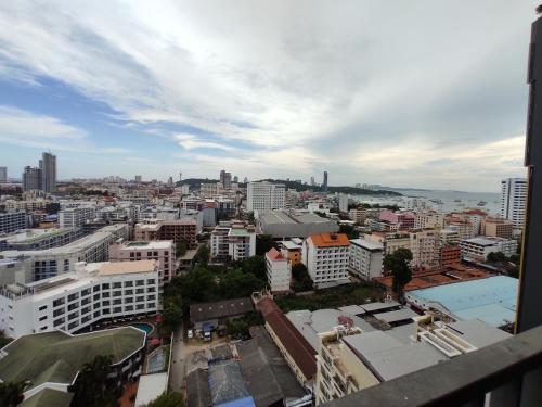 a view of a city from a building at Many Holiday The Base Condo in Pattaya Central