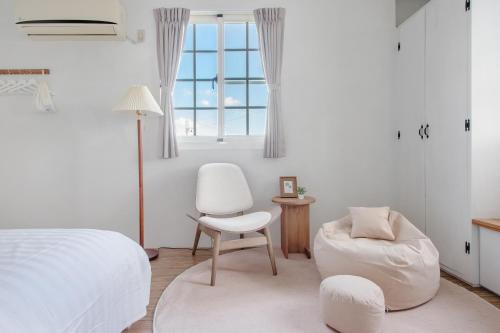 Katil atau katil-katil dalam bilik di Taitung Homeabout Pet Friendly Hall