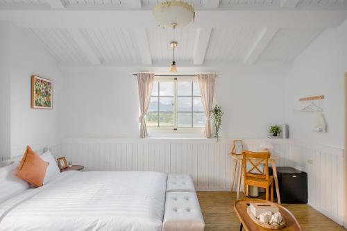 Katil atau katil-katil dalam bilik di Taitung Homeabout Pet Friendly Hall