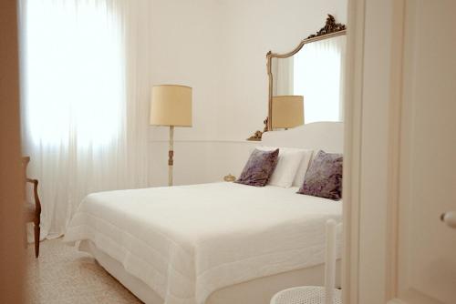 Relais Carlo Albertoにあるベッド