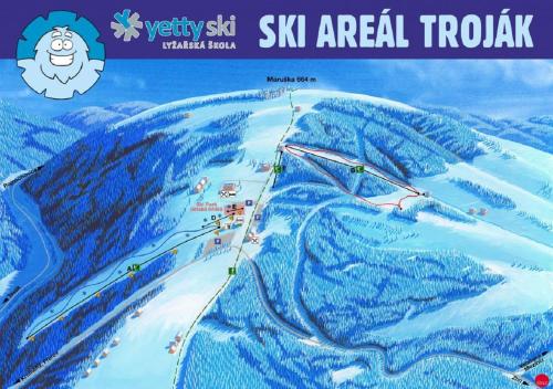 a poster of a ski resort with a ski slope at Apartment WELLNESS Vlčková in Vlčková
