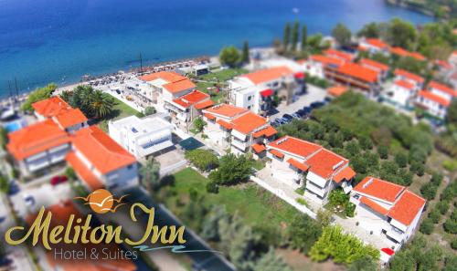 a model of a house with orange roofs at Meliton Inn Hotel & Suites by the beach in Neos Marmaras