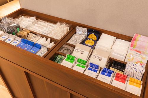 a drawer filled with different types of food items at Sotetsu Grand Fresa Kumamoto in Kumamoto