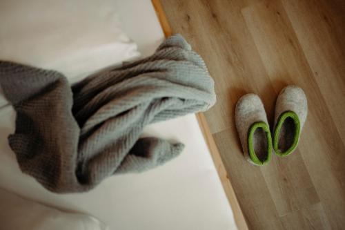 a pair of green scissors sitting on top of a table at Appartement Wiederkehr in Flachau