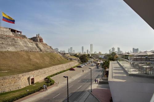a view of a street with a city in the background at GHL San Lazaro Art Hotel in Cartagena de Indias