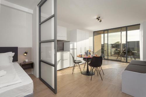 Letto o letti in una camera di Residence Del Mar Emotion