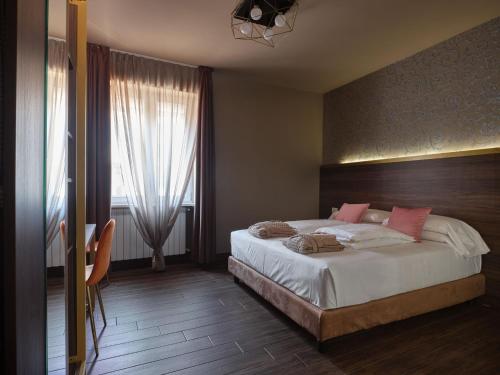 Katil atau katil-katil dalam bilik di Hotel Giulietta