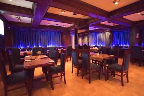 Restaurant ou autre lieu de restauration dans l'établissement Hotel Delta