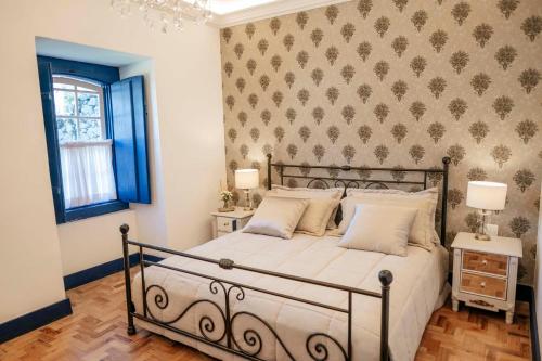 Ліжко або ліжка в номері Pousada Boutique Villa Chafariz Tiradentes