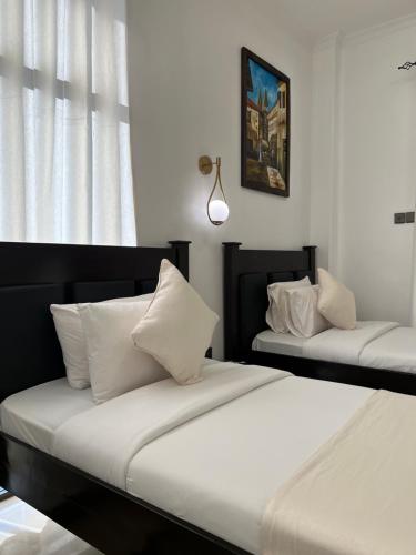 Кровать или кровати в номере Dreams Hotel Zanzibar