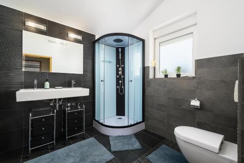 Kúpeľňa v ubytovaní Villa Elisa