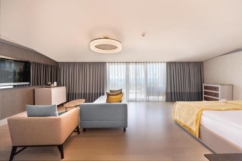 Postel nebo postele na pokoji v ubytování Arum Barut Collection - Ultra All Inclusive