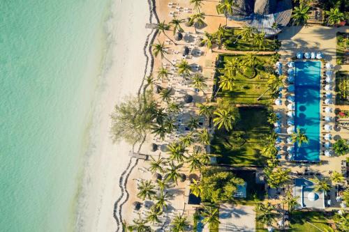 an aerial view of a resort next to the ocean at TUI BLUE Bahari Zanzibar in Pwani Mchangani