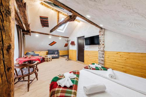 A bed or beds in a room at Sofia Folklore Life Apartment