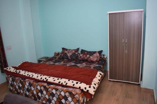 Postel nebo postele na pokoji v ubytování Pine Wood