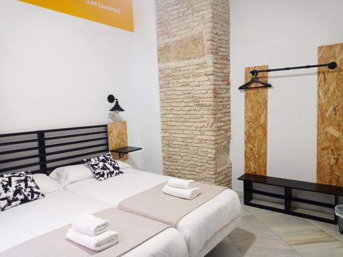 Posteľ alebo postele v izbe v ubytovaní Planeta Cadiz Hostel