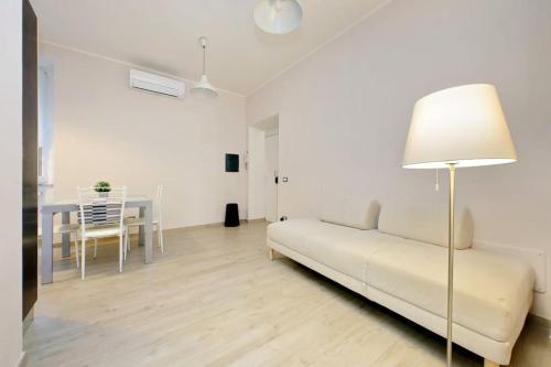 a living room with a couch and a table at Casa Testaccio in Rome