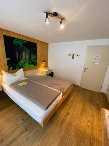 Postel nebo postele na pokoji v ubytování Hotel Garni Jägerhof