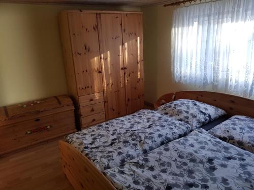 Ένα ή περισσότερα κρεβάτια σε δωμάτιο στο Ferienhaus Gampe