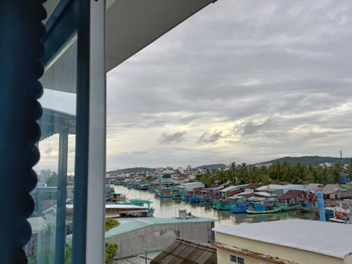 a view from a window of a marina at Nhà nghỉ Phương Dung in Phu Quoc