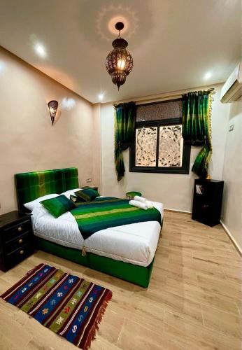 Кровать или кровати в номере Stay In Fez