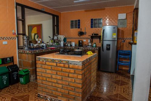Kuchyň nebo kuchyňský kout v ubytování CAFE RACER HOSTEL