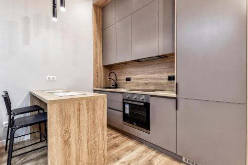 Η κουζίνα ή μικρή κουζίνα στο Aura Business class apartment