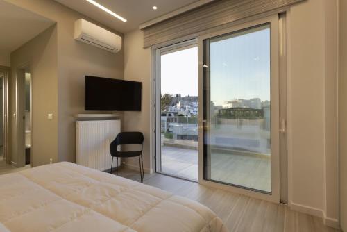 Posteľ alebo postele v izbe v ubytovaní Über Lux 2 BR New Penthouse with Acropolis View