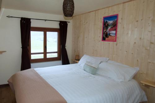 Postel nebo postele na pokoji v ubytování Chalet Ouréa