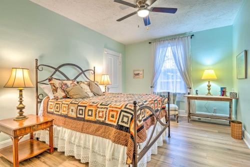 a bedroom with a bed and a ceiling fan at Peaceful Indianapolis Retreat 20 Min to Dtwn in Indianapolis