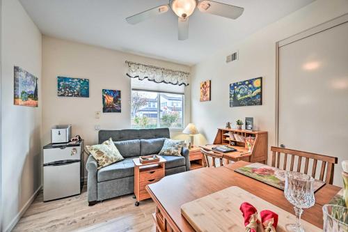 a living room with a couch and a table at Chula Vista Studio with Hot Tub about 9 Mi to Downtown in Chula Vista