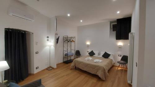 Ένα ή περισσότερα κρεβάτια σε δωμάτιο στο Casa Dei Normanni: DEA al mare