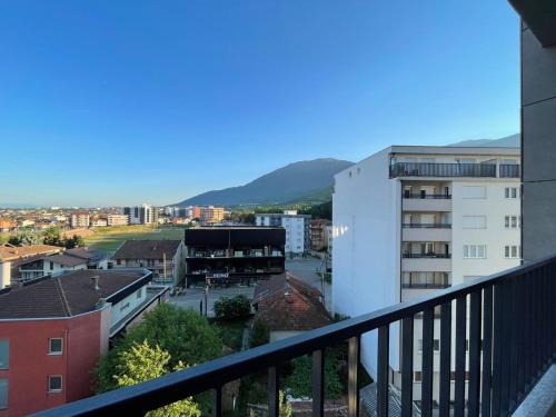 a view of a city from a balcony at Lovely apartment in Peja Citycenter in Peje