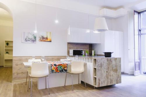 GuestHost - BOOK NOW! Corso Buenos Aires & Loreto M1 Apartment